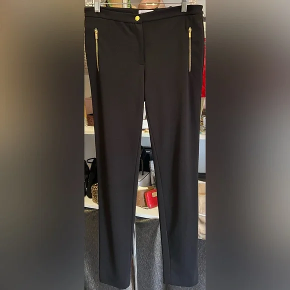 Calvin Klein - Never worn, classic black with gold zipper pockets. Size 4 - Picture 1 of 3